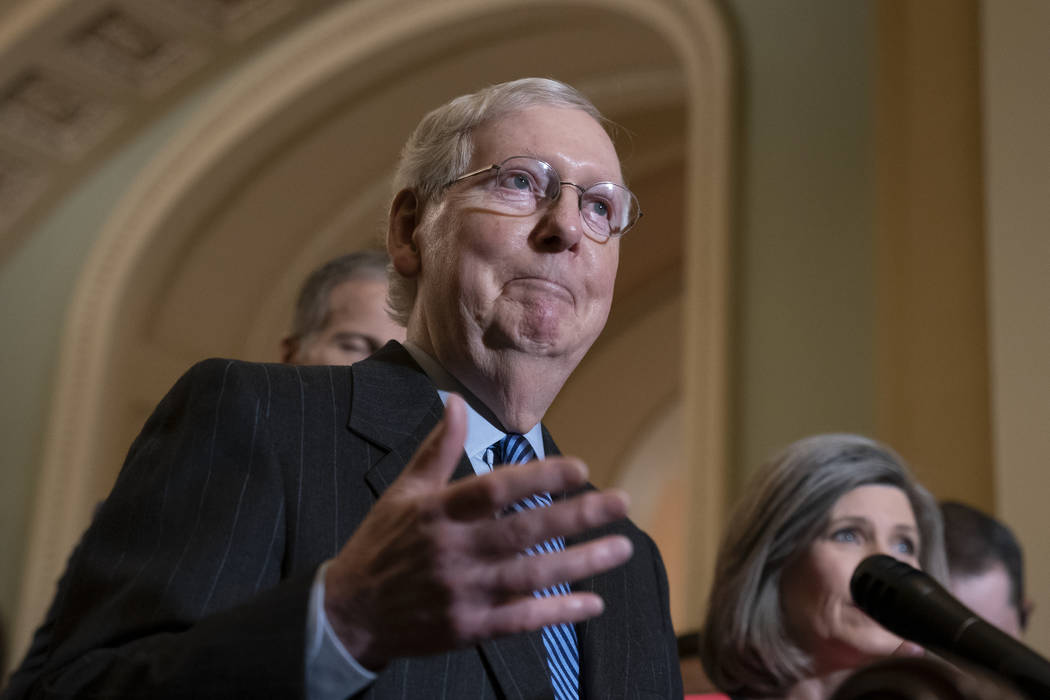 Senate Majority Leader Mitch McConnell, R-Ky., tells reporters he has secured enough Republican ...