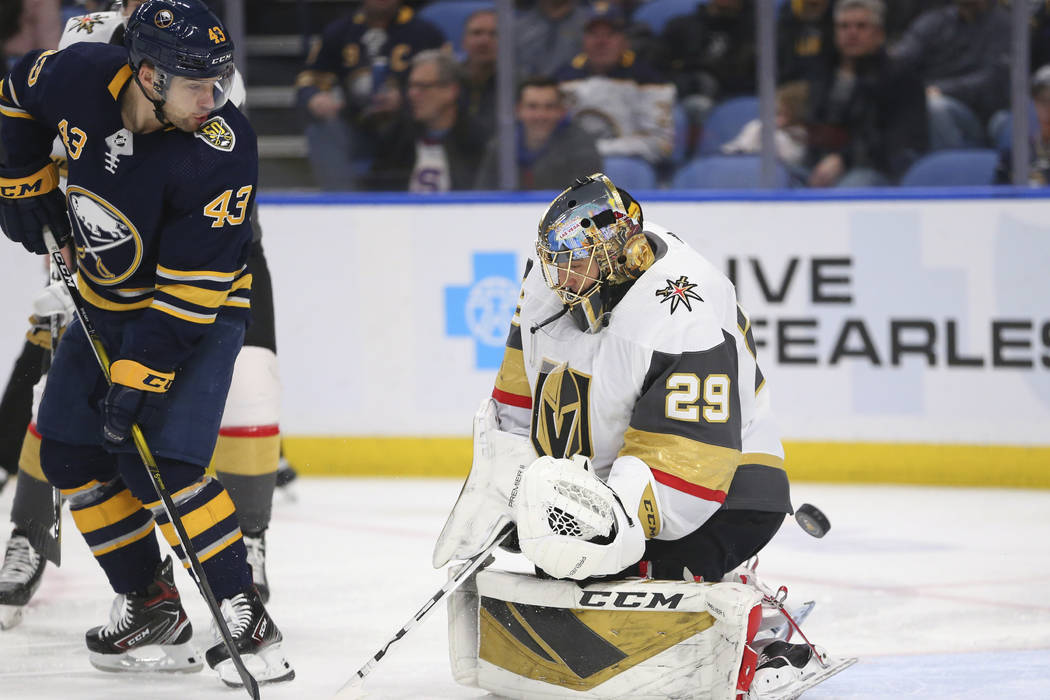 Buffalo Sabres forward Conor Sheary (43) is stopped by Vegas Golden Knights goalie Marc-Andre F ...