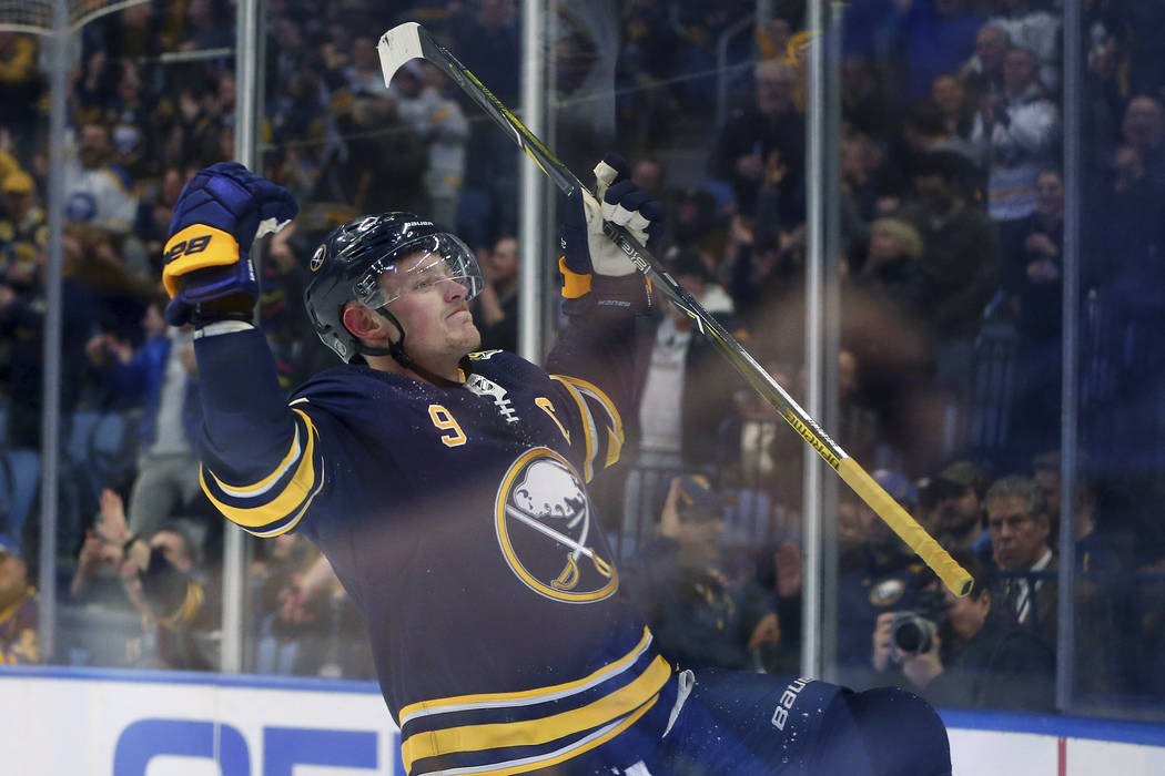 Buffalo Sabres forward Jack Eichel (9) celebrates his goal during the third period of an NHL ho ...