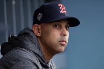 FILE - In this Oct. 28, 2018, file photo, Boston Red Sox manager Alex Cora waits for the start ...