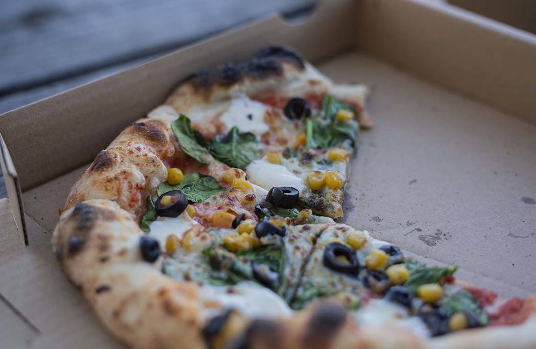 A Veggie pizza from Custom Pizza Truck is seen on Thursday, Jan. 16, 2020, in Las Vegas. (Eliza ...