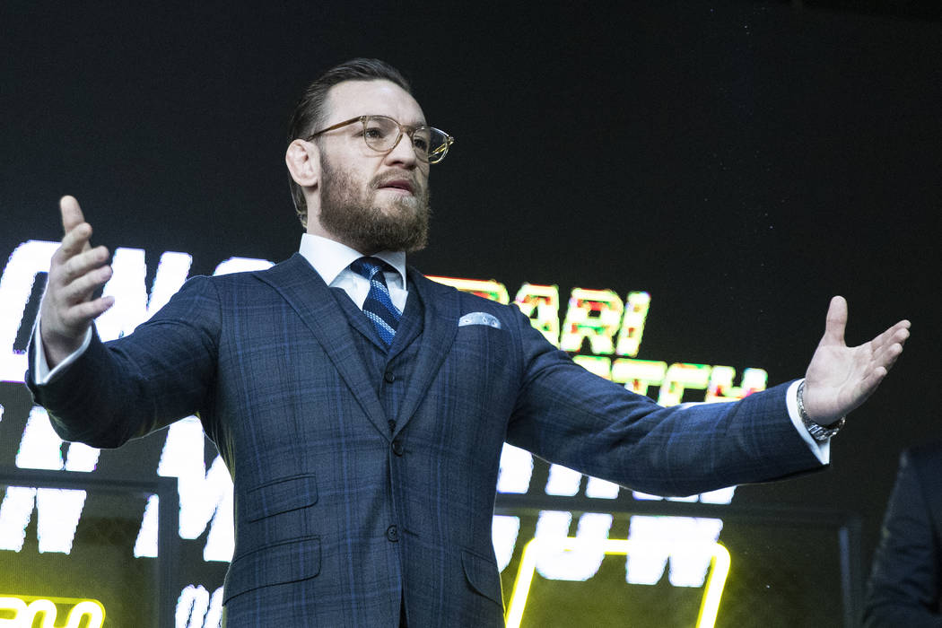 UFC fighter Conor McGregor gestures during a news conference in Moscow, Russia, Thursday, Oct. ...