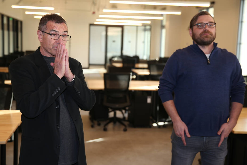DraftKings's Johnny Avello, left, director of race and sports books operations, with Matt Kalis ...