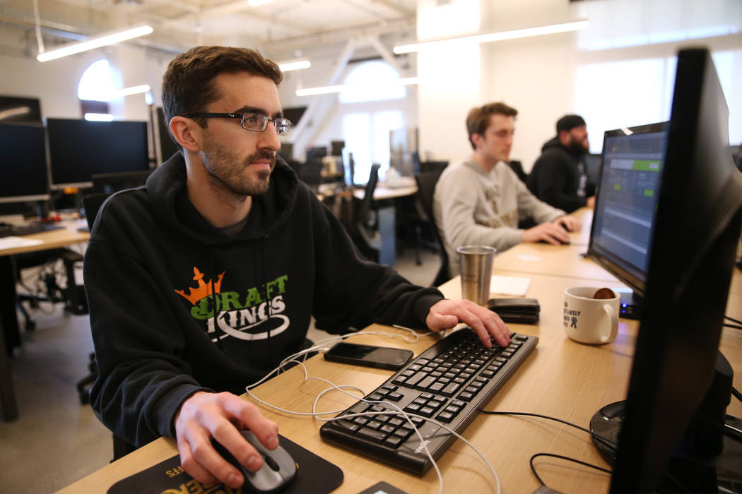 Will Pagliaro, costumer experience team leader for DraftKings, works inside the new DraftKings ...