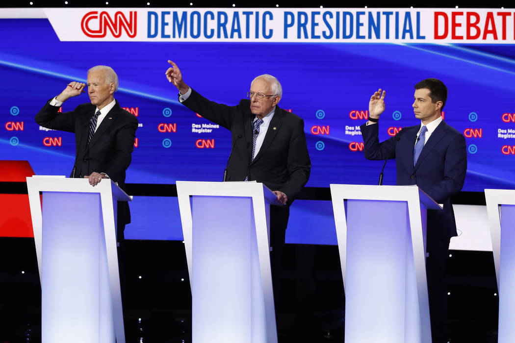 From left, Democratic presidential candidate former Vice President Joe Biden, Sen. Bernie Sande ...