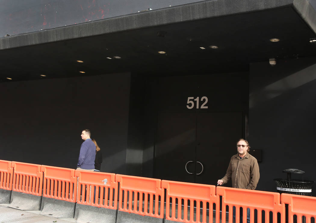 Pedestrians walk past a nightclub, previously known as Red, at 512 Fremont Street on Tuesday, D ...