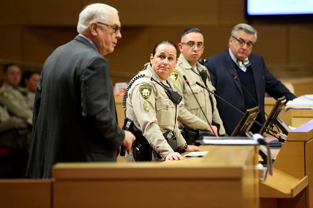 Clyde DeWitt, attorney for owner owner RTB, Inc., left, argues against closing Fremont East nig ...