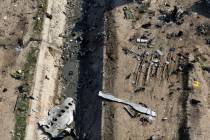 In this Wednesday, Jan. 8, 2020 photo, wreckage from a Ukrainian plane is seen on the ground a ...