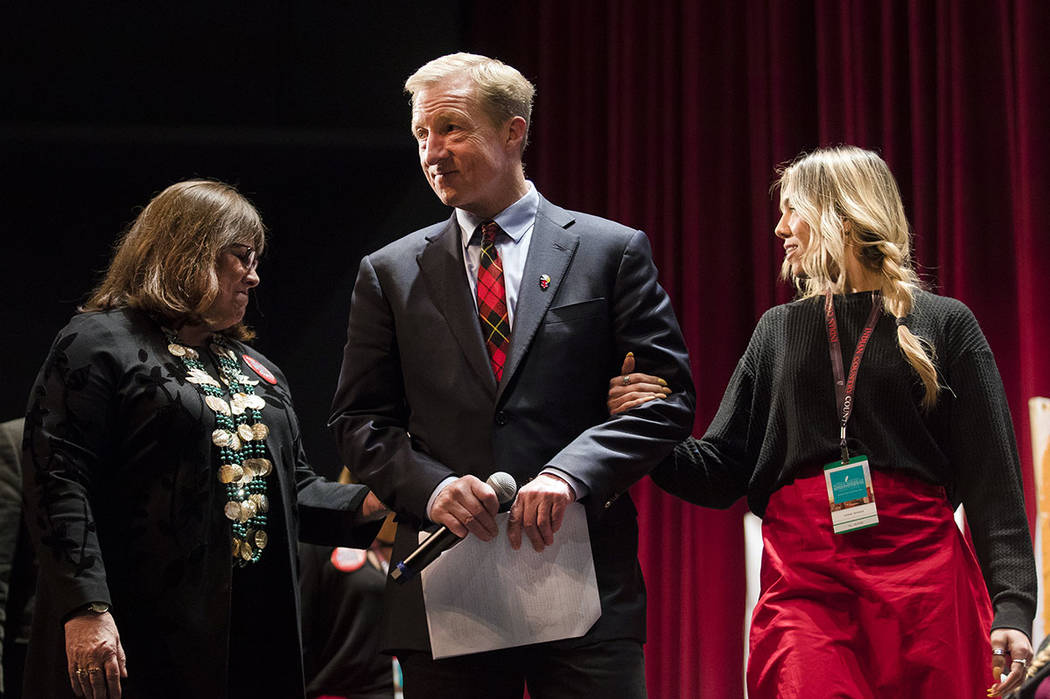 Susan Masten, left, co-president of Women Empowering Women for Indigenous Women, escorts democr ...