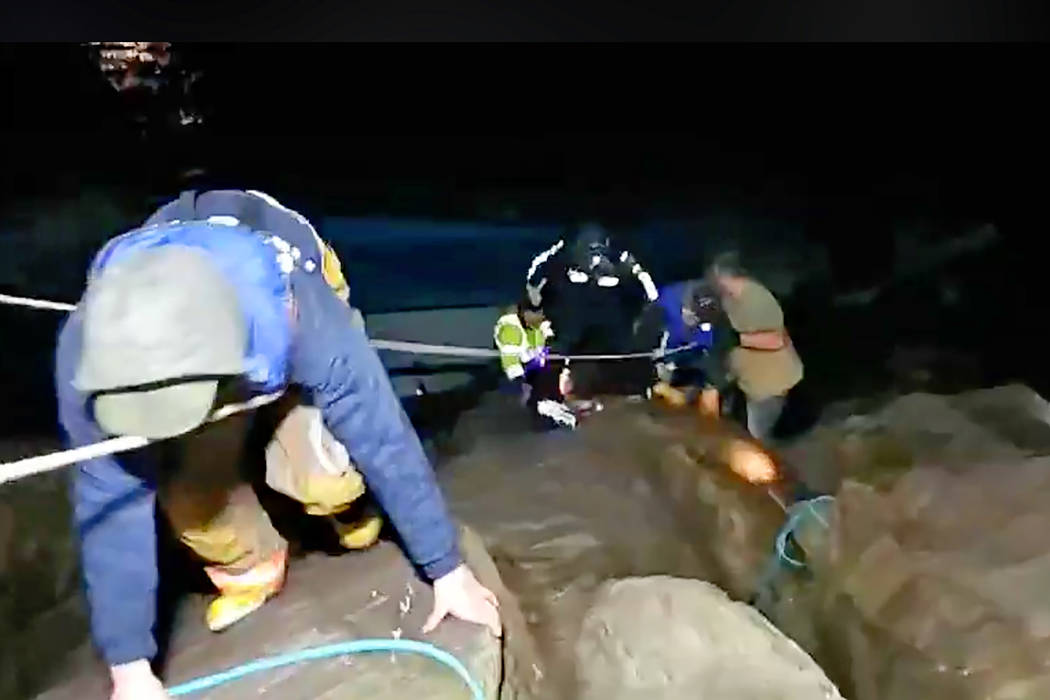 This photo from video provided by Rob Gensorek of Basin Tackle Charleston shows firefighters re ...