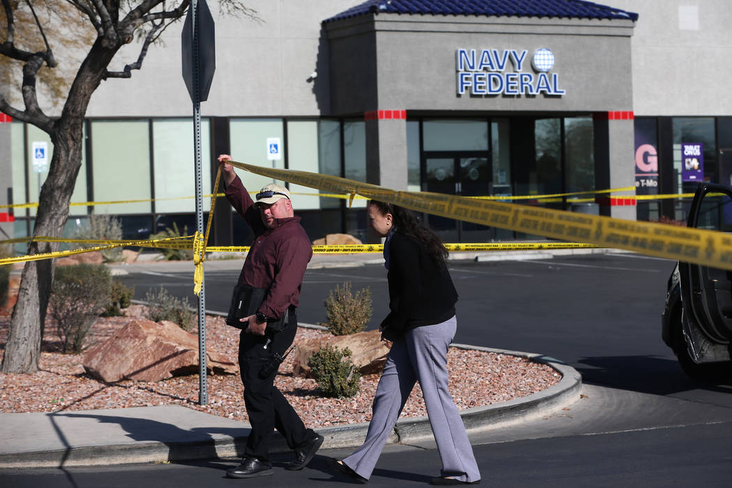 Las Vegas police investigate an officer-involved shooting that occurred in the 6900 block of Sp ...