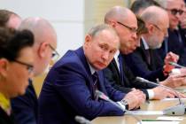 Russian President Vladimir Putin attends a meeting on drafting constitutional changes at the No ...