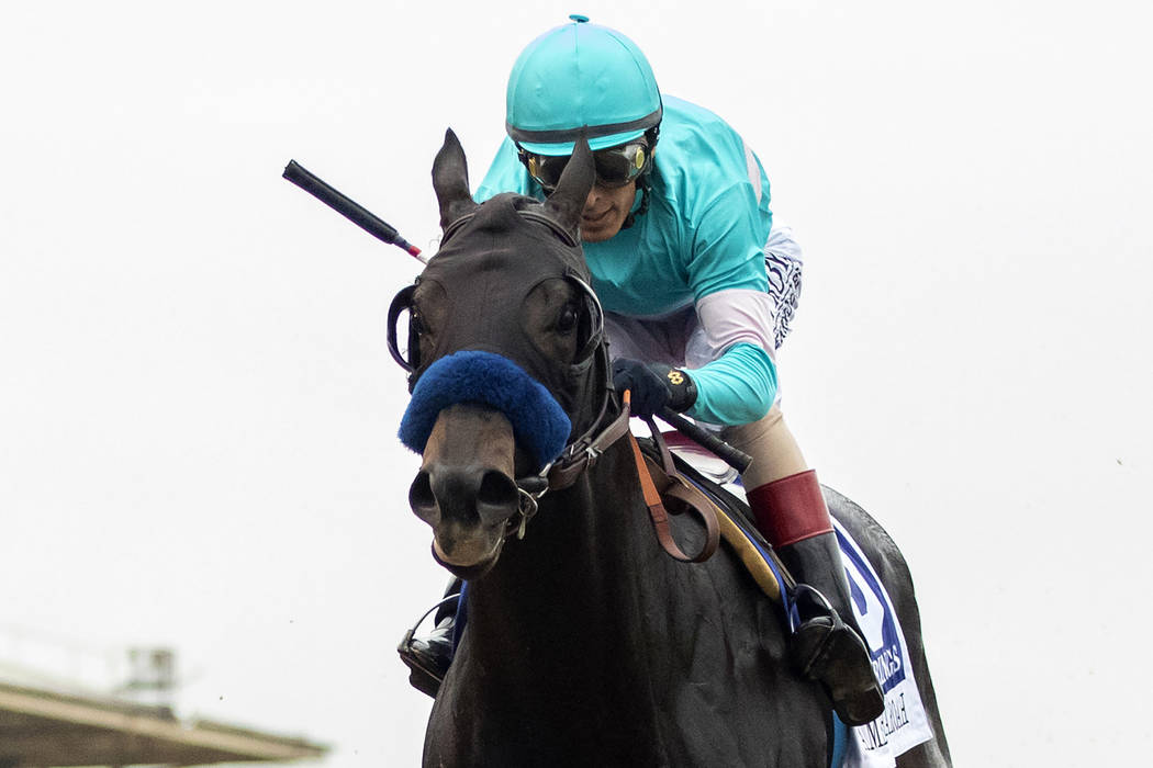 In this image provided by Benoit Photo, Eight Rings, with John Velazquez aboard, wins the Grade ...