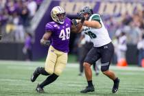 Bishop Gorman graduate Edufuan Ulofoshio, a walk-on at the University of Washington who grew up ...