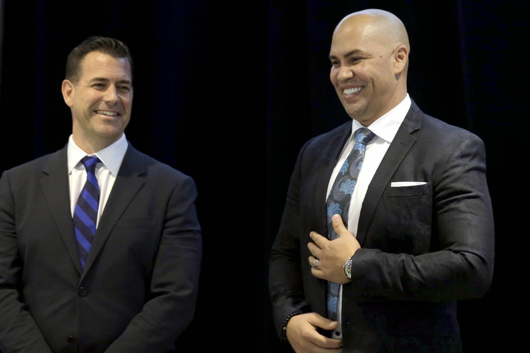 FILE - In this Nov. 4, 2019, file photo, New York Mets new manager, Carlos Beltran, right, laug ...