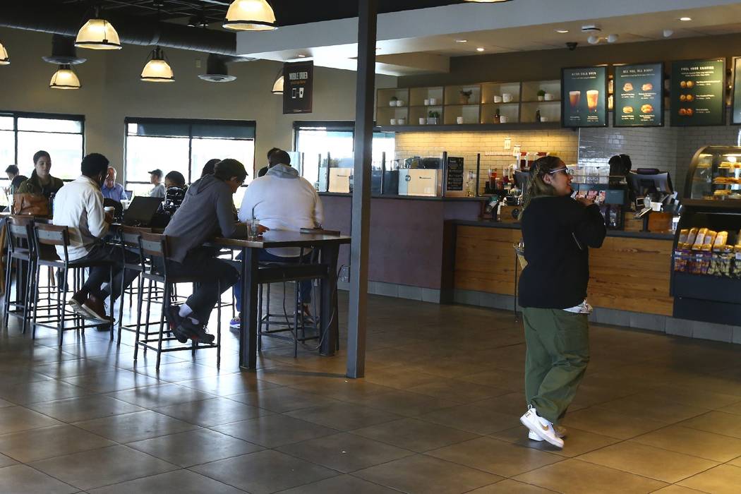 This Wednesday, Jan. 15, 2020, photo, shows patrons at a local Starbucks Community Store, in Ph ...