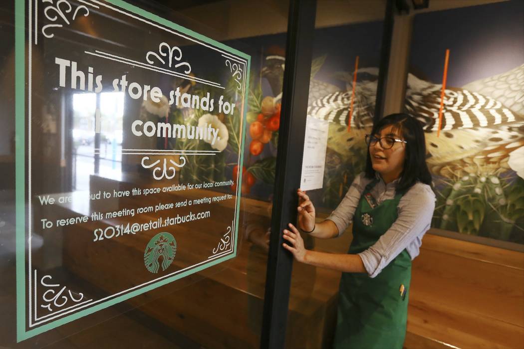 In this Wednesday, Jan. 15, 2020, photo, Belith Ariza, a barista trainer at Starbucks, opens th ...