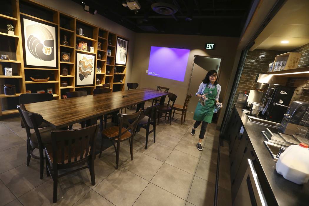In this Wednesday, Jan. 15, 2020, photo, Belith Ariza, a barista trainer at Starbucks, does som ...