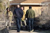 Las Vegas police and Las Vegas fire officials investigate after a person died in a shed fire at ...
