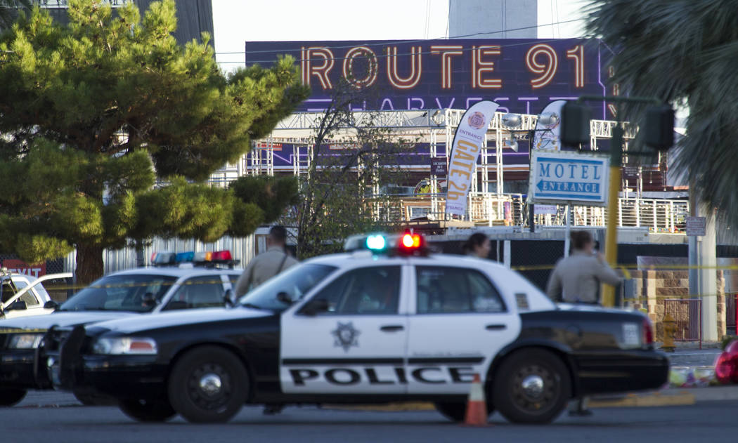 Las Vegas police block the roads at the scene along Las Vegas Boulevard and Reno Avenue on Mond ...