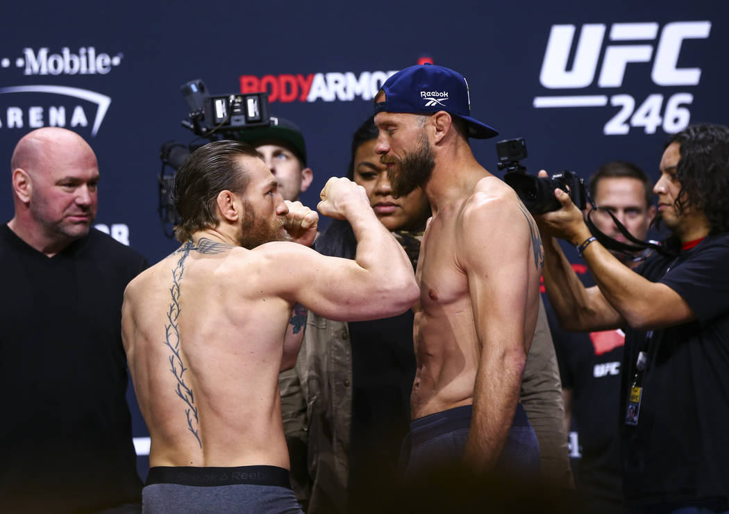 Conor McGregor faces off against Donald "Cowboy" Cerrone ahead of their welterweight ...