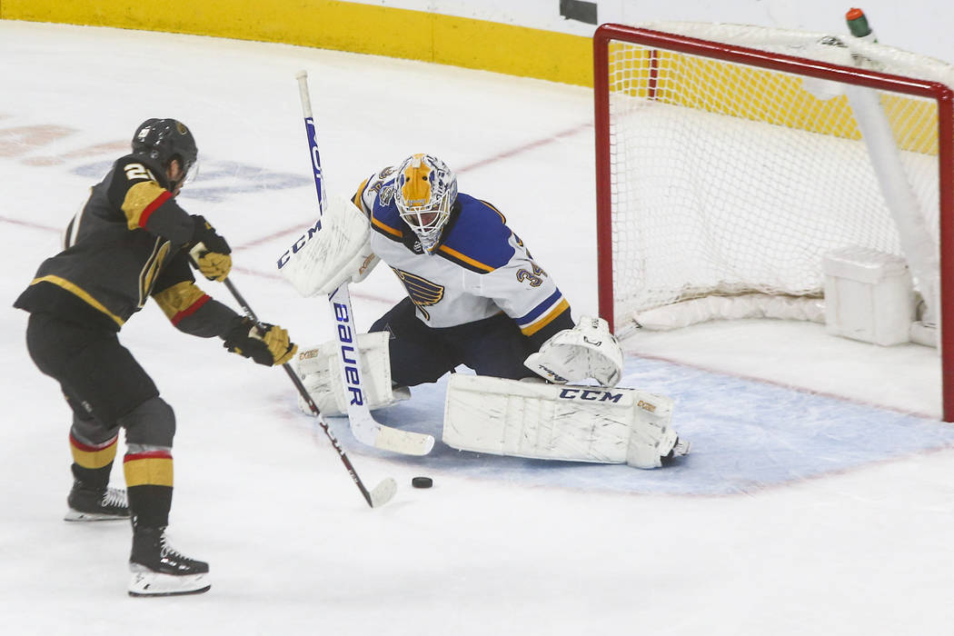 Golden Knights' Chandler Stephenson (20) lines up his game-winning shot against St. Louis Blues ...