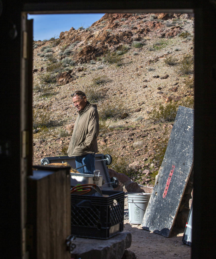 Richard Roman continues to clean out his cave after being evicted by Boulder City in the hills ...