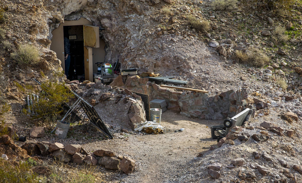 Richard Roman continues to clean out his cave after being evicted by Boulder City in the hills ...