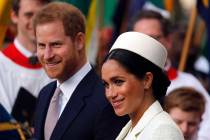 In this Monday, March 11, 2019 file photo, Britain's Prince Harry and Meghan, the Duchess of Su ...