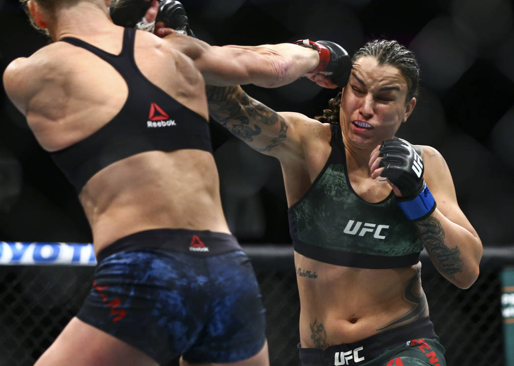 fights Raquel Pennington during their bantamweight bout at UFC 246 at T-Mob...