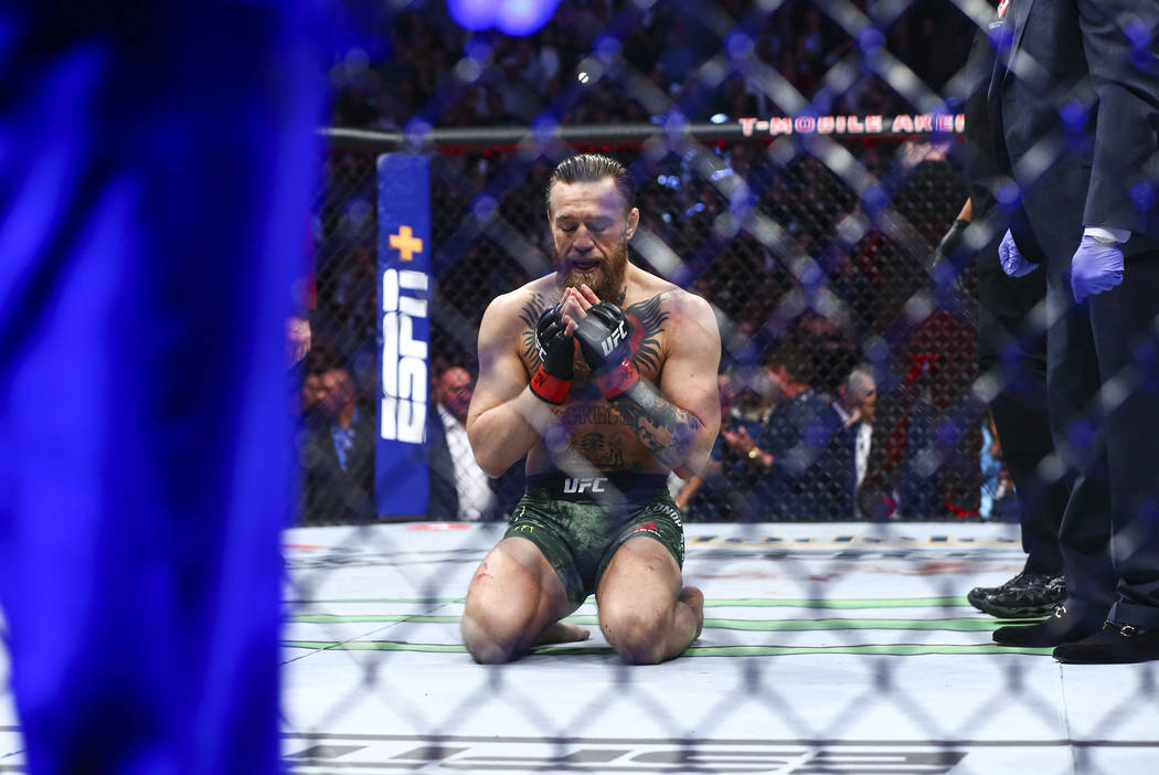 Conor McGregor reacts after defeating Donald "Cowboy" Cerrone via technical knockout ...