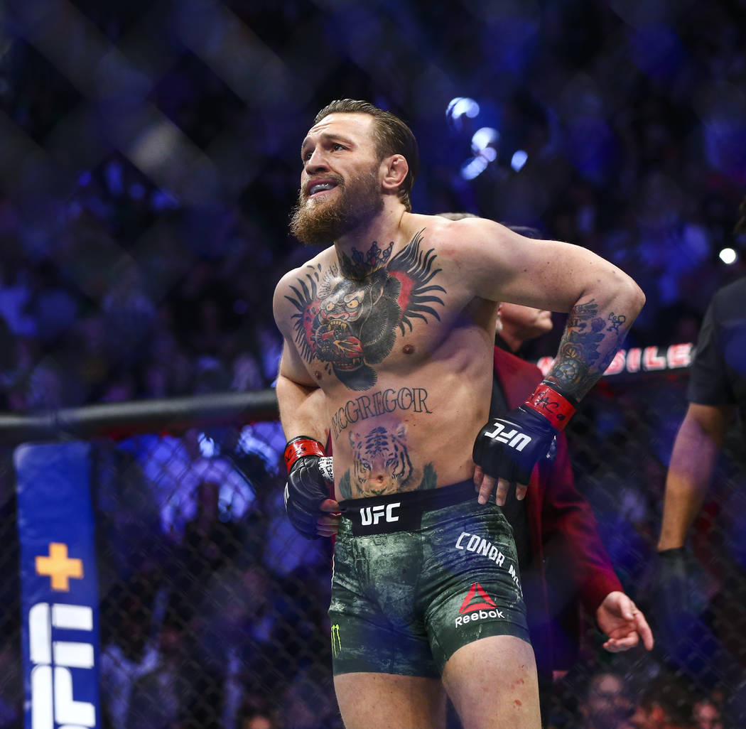 Conor McGregor reacts after defeating Donald "Cowboy" Cerrone via technical knockout ...