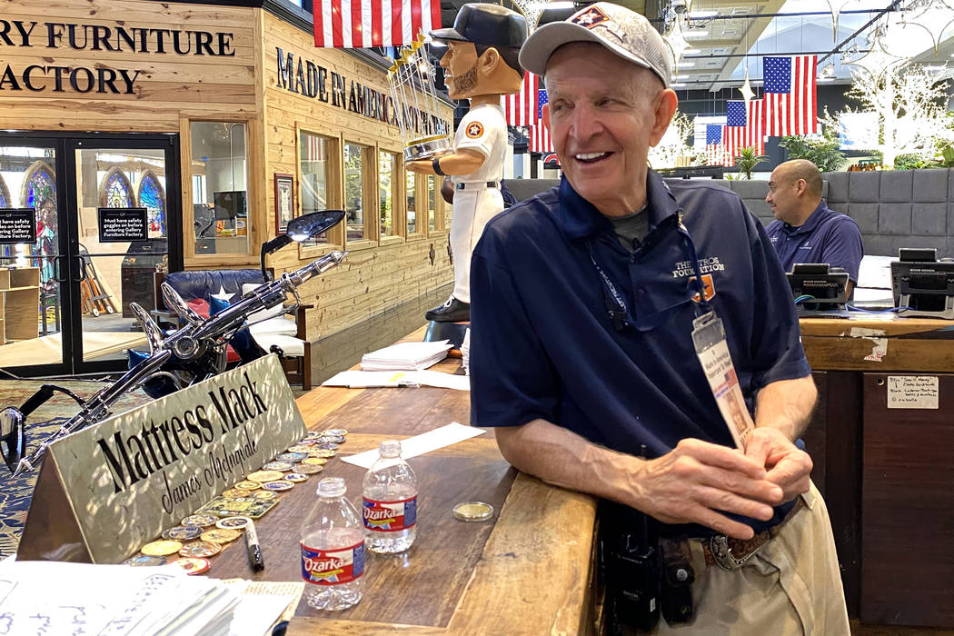 Houston furniture store owner Jim "Mattress Mack" McIngvale, 68, mans the counter in ...