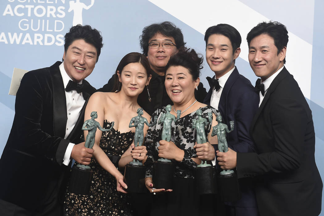 Kang-Ho Song, from left, Park So-dam, Bong Joon-ho, Jang Hye-jin, Choi Woo-shik, and Lee Sun Gy ...