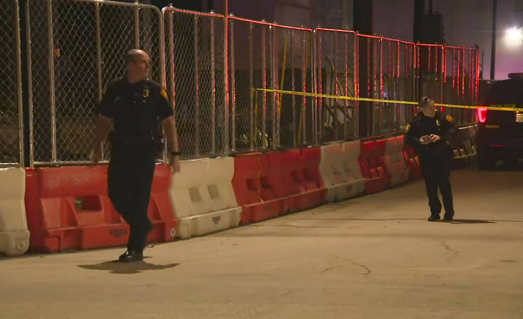 San Antonio police officers work near the scene of a deadly shooting at the Ventura, a music ve ...