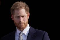 In a Thursday, Jan. 16, 2020, file photo, Britain's Prince Harry arrives in the gardens of Buck ...