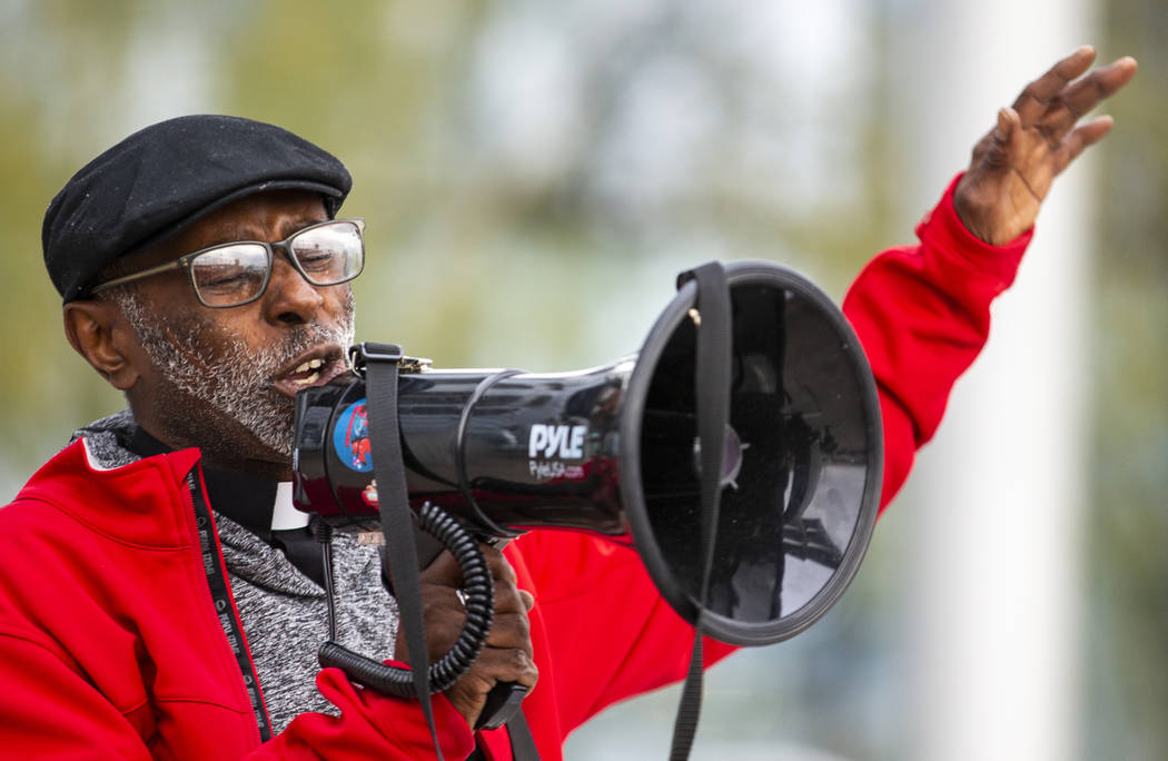 The Rev. Harold Washington-Carnes speaks as local activists rally at the Las Vegas City Hall th ...