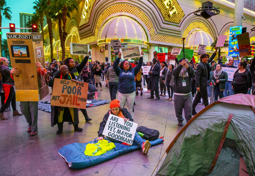 Local activists block Casino Center Blvd. through the Fremont Experience following a rally at t ...