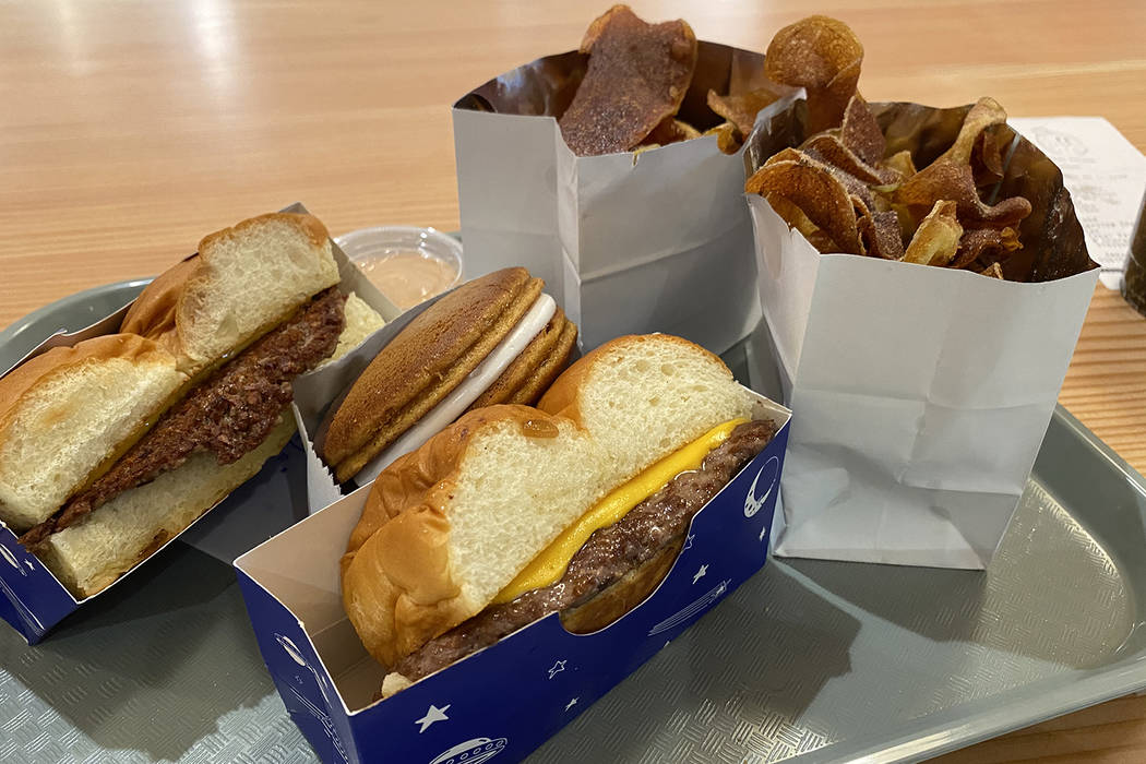 Not Beef Tasty (left), Half Dip, Beef Tasty and two types of hot chips (plain on left, honey bu ...