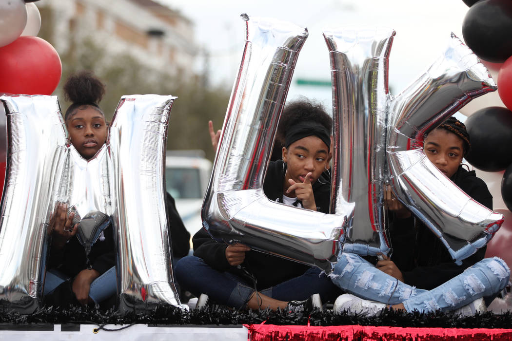 A float with MLK initials is seen during the 38th annual Dr. Martin Luther King Jr. Parade in d ...