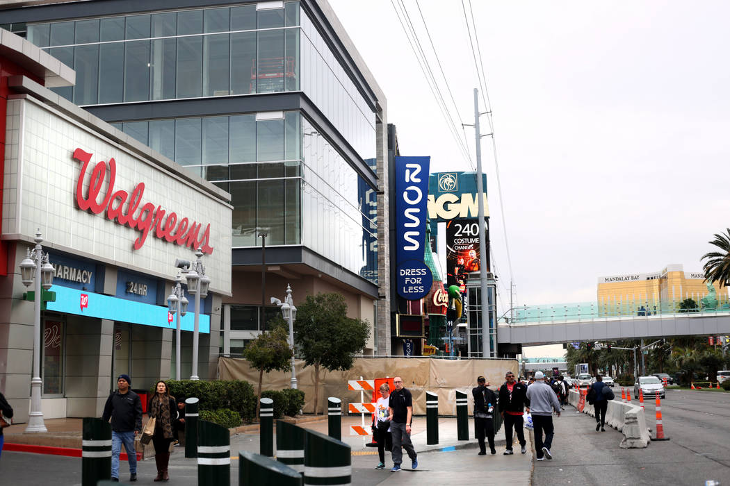 Pedestrians pass the Walgreens on the Strip located at 3765 Las Vegas Blvd. South on Monday, Ja ...