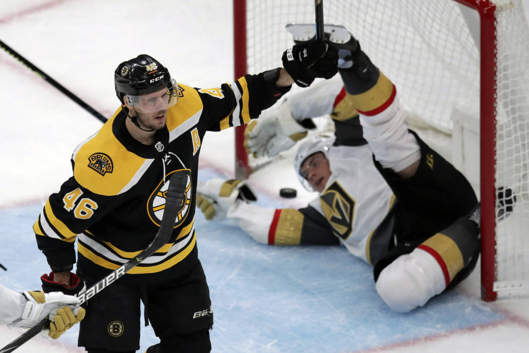 Boston Bruins center David Krejci (46) celebrates after scoring on Vegas Golden Knights defense ...