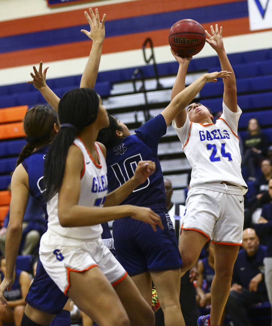 Bishop Gorman's Bentleigh Hoskins (24) shoots over Spring Valley's Riahana Davis (10) during th ...