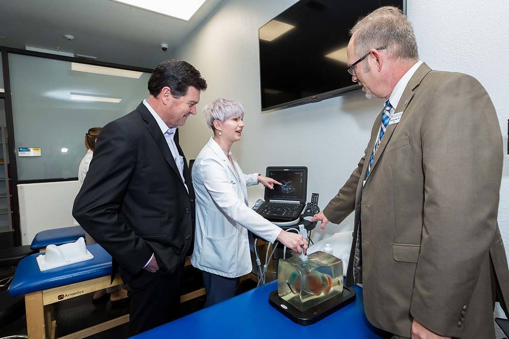 Erica Stiles, a student at Touro University Nevada, demonstrates the school's new ultrasound eq ...