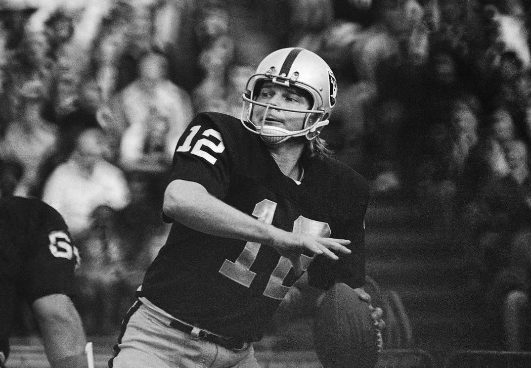In this 1974 file photo, Oakland Raiders quarterback Ken Stabler looks to pass. (AP Photo)