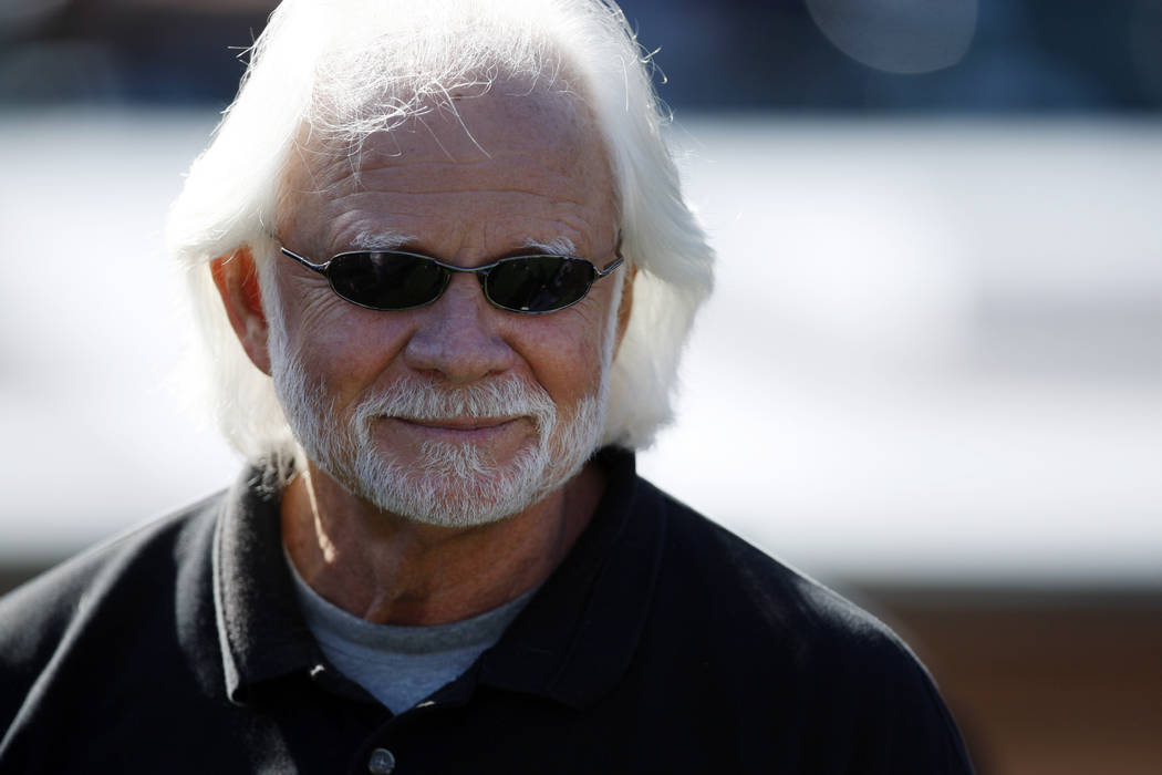 In this Oct. 25, 2009, file photo, former Oakland Raiders quarteback Ken Stabler watches during ...