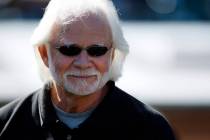 In this Oct. 25, 2009, file photo, former Oakland Raiders quarteback Ken Stabler watches during ...