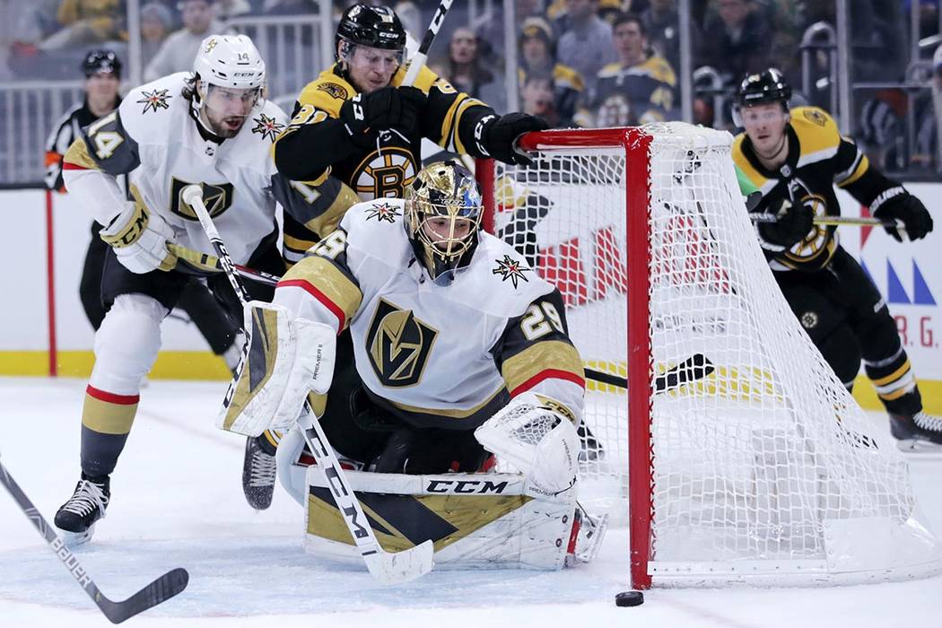 Vegas Golden Knights goaltender Marc-Andre Fleury (29) watches the puck slide near the post as ...