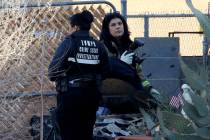 Las Vegas Metropolitan Police Department Crime scene investigators investigate after a shed fir ...