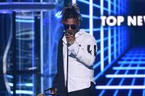 FILE - In this May 1, 2019 file photo, Juice WRLD accepts the award for top new artist at the B ...